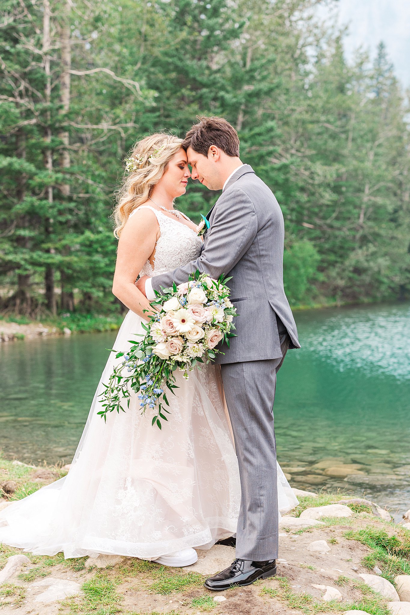 smokey-summer-edmonton-bride-groom-wedding-banff-rocky-mountain-resort-aqua-pink-ethereal-photography-inc_0034.jpg